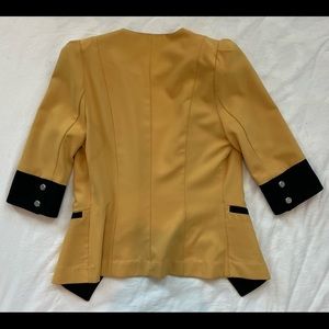 Mustard yellow and black blazer, bought in Korea. Tight on me now.